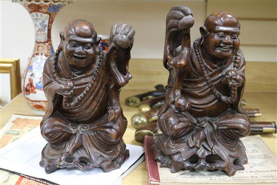 Two Chinese hardwood carvings, boxed, 12in.